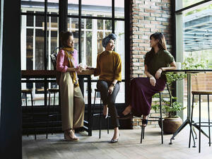 Malaysian singer Yuna, center, is pictured modeling Uniqlo's hijab fashion line designed by Hana Tajima. (Uniqlo)