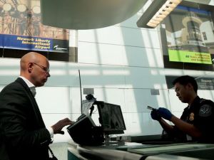 Checking for fraud at the airport.