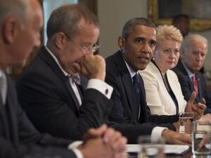 US President Barack Obama delivers a statement on Syria during a meeting with Latvia President Andris Berzins, Estonia President Toomas Hendrik Ilves Lithuania's President Dalia Grybauskaite and Vice President Joe Biden at the White House in Washington, DC, August 30, 2013.  AFP PHOTO/Jim WATSON