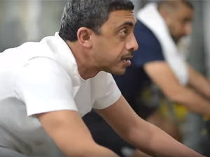 A video of the Dubai minister sweating it out on a spinning bike at a gym was uploaded on YouTube by the ministry on Sunday. (YouTube)