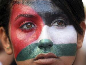 A woman takes part in a demonstration in France against Israel's summer 2014 military campaign in Gaza.  (AFP/Boris Horvat)