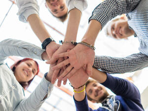 Happiness is no longer a choice for companies wishing to maximize return on their most valuable investments: their people. (File photo)