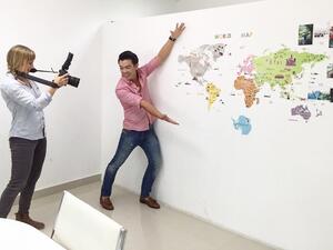 Wonho celebrates premiering the first episode of his travel show "Wonho Around the World." (Facebook)