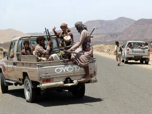 Yemeni fighters loyal to exiled President Abed Rabbo Mansour Hadi wait in their pick-up trucks on a road in the Sirwah area, in Marib province on April 9, 2016. (AFP/Nabil Hassan) Yemeni fighters loyal to exiled President Abed Rabbo Mansour Hadi wait in their pick-up trucks on a road in the Sirwah area, in Marib province on April 9, 2016. (AFP/Nabil Hassan)