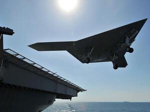 An unmanned drone carries out a touch go landing in the Atlantic (US Navy/AFP)