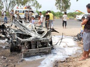 Yemenis inspect a charred vehicle following a suicide car bombing attack that targeted the convoy of Aden's governor, in the southern city of Aden on July 15, 2016. (AFP/Saleh al-Obeidi) Yemenis inspect a charred vehicle following a suicide car bombing attack that targeted the convoy of Aden's governor, in the southern city of Aden on July 15, 2016. (AFP/Saleh al-Obeidi)