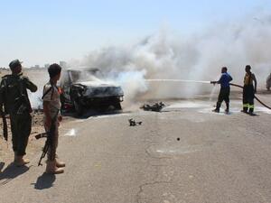 Yemeni security forces extinguish fire at a site where a bomb-laden car exploded in Aden's Mansura district on May 1, 2016. (AFP/Saleh al-Obeidi) Yemeni security forces extinguish fire at a site where a bomb-laden car exploded in Aden's Mansura district on May 1, 2016. (AFP/Saleh al-Obeidi)