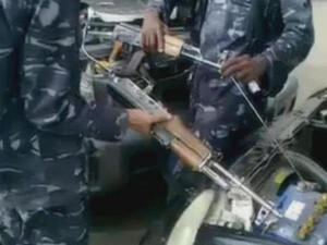 Two Yemeni soldiers rigging up their AK-47 starter improv. [YouTube]
