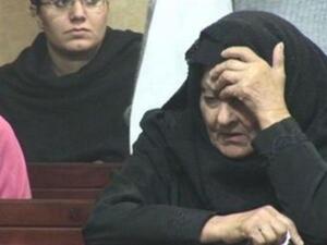 مسيحية تبكي قتلى الهجوم على الكنيسة 