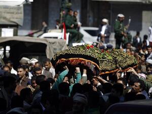 Yemeni mourners carry the coffin of Abdel Qader Hilal, the mayor of the capital Sanaa, on October 10, 2016 after he was killed in an air strike on a funeral in the Yemeni capital three days ago. (AFP/Mohammed Huwais)