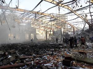 This file photo taken on October 8, 2016 shows a general view of the destruction following reported airstrikes on a funeral hall by Saudi-led coalition air-planes on a building in the capital Sanaa. (AFP/Mohammed Huwais)