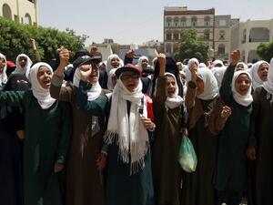 Yemeni students shout slogans during a rally at a school in the capital Sanaa protesting the deployment of US Special Forces to their country, amid the ongoing conflict in the impoverished Arab state, on May 23, 2016. (AFP/Mohammed Huwais) Yemeni students shout slogans during a rally at a school in the capital Sanaa protesting the deployment of US Special Forces to their country, amid the ongoing conflict in the impoverished Arab state, on May 23, 2016. (AFP/Mohammed Huwais)