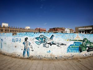 A mural depicting military images is shown in Yemen. Yemen has seen a long period of fighting between the military and militants linked to Al-Qaeda. (Image credit: Getty)