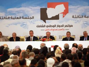 Yemen's President Yemeni President Abdrabuh Mansur Hadi (C) speaks during the closing session of a conference on national dialogue in the Yemeni capital Sanaa. (Image credit: AFP)