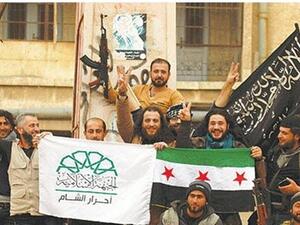 فرحة عناصر "جيش الفتح" بتحرير إدلب في آذار/ مارس الماضي - أرشيف