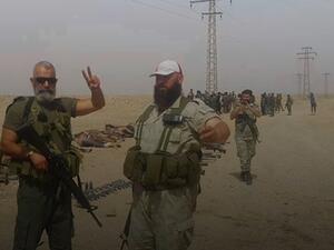 ليست المرة الأولى التي يظهر فيها زهر الدين متباهيا أمام جثث داعش 