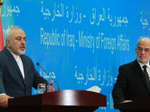 وزير الخارجية الايراني محمد جواد ظريف في مؤتمر صحافي مشترك مع نظيره العراقي ابراهيم الجعفري