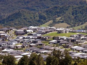 Australia to triple fees on foreign-owned empty houses as rent surges