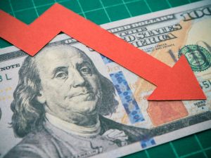 US dollar dips as EM currencies rise