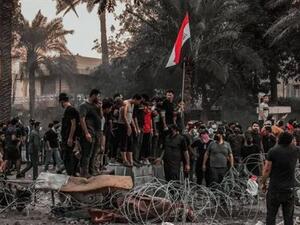 قتيل خلال تبادل اطلاق نار بين قوات الامن ومتظاهرين في بغداد