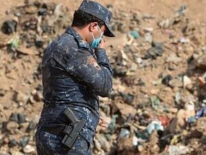 فتح مقبرة جماعية لدواعش وأقربائهم في الموصل