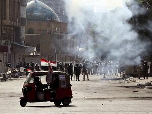 اشتباكات جديدة بين قوات الامن والمتظاهرين ببغداد