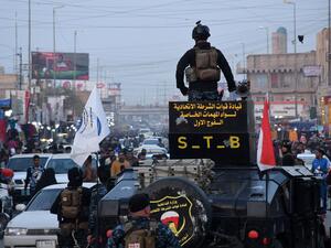 صدامات بين متظاهرين وقوات الأمن في الناصرية جنوب شرقي العراق