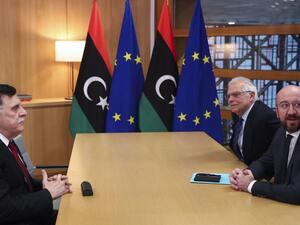 السراج في بروكسل وسط مساعٍ أوروبية للتهدئة بليبيا