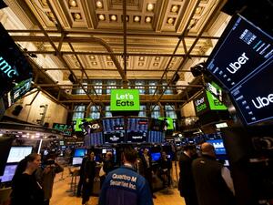 Uber Technologies Inc’s conservative initial public offering could not keep its shares from sinking in their trading debut on Friday, fueling debate on Wall Street