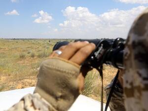 A fighter loyal to Libya's Government of National Accord (GNA) mans a position west of the city of Aziziah, some 60 kilometres southwest of the capital Tripoli (AFP)