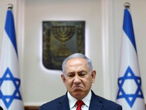 Israeli Prime Minister Benjamin Netanyahu grimaces as he chairs the weekly cabinet meeting at his office in Jerusalem on July 7, 2019.  ABIR SULTAN / POOL / AFP
