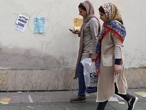 Tehran University students — men and women — protesting the pressure on women to wear mandatory headscarves in public  (Twitter)