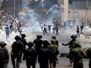 إصابة عشرات الفلسطينيين خلال مواجهات مع جيش الاحتلال 