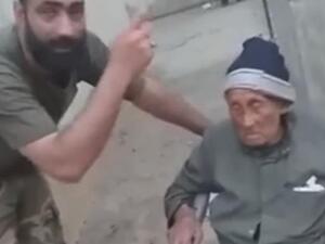 عناصر من النظام السوري يهينون مسنا في ريف حماة