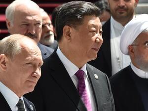 Russian President Vladimir Putin, Chinese President Xi Jinping and Iran's President Hassan Rouhani,  June 14 /AFP