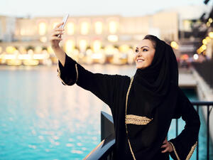 Woman taking selfie in Dubai