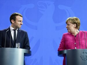 المستشارة الالمانية انغيلا ميركل والرئيس الفرنسي إيمانويل ماكرون