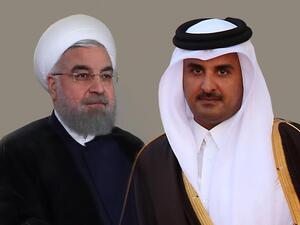 الرئيس الإيراني حسن روحاني وأمير قطر الشيخ تميم بن حمد 