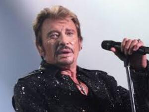 ابن الفنان الراحل جوني هاليداي يتنازل عن ميراث والده