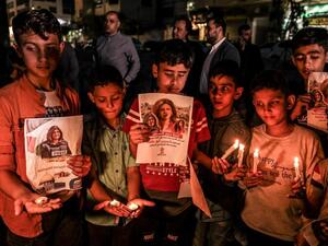 In Pictures: Funerals Held After Palestinian Journalist Killed