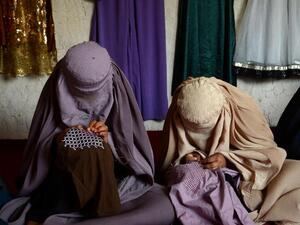 Afghan Women TV Presenters Cover Faces on Air (AFP)