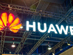 In this July 4, 2018, file photo, the Huawei logo is seen at a Huawei store at a shopping mall in Beijing. 