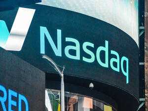 Tesla Lifts Nasdaq to Record-High Close