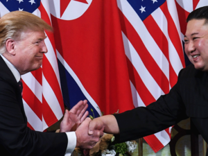 President Donald Trump shakes hands with North Korea's leader Kim Jong Un following a meeting in Hanoi. 