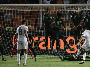 Senegal will play Algeria in Friday's Africa Cup of Nations final after Riyad Mahrez scored a free-kick in the 95th minute.