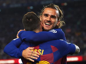 غريزمان وميسي