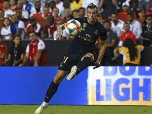  Having failed to find a suitable buyer for the Welsh forward over the course of the transfer window, Real will retain his services another year 