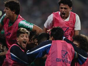 Iraq's players celebrates their win