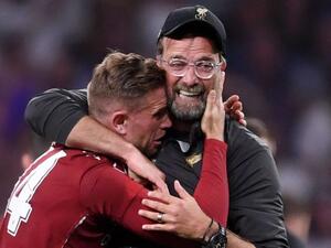 كلوب يحتفل مع جوردان هندرسون