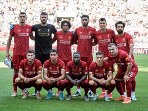 Mohamed Salah, Virgil van Dijk and Divock Origi were on target as Liverpool started the new Premier League season by beating Norwich City.
